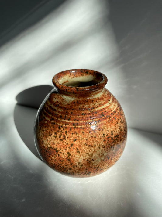 A. Short chai bottle vase with lines