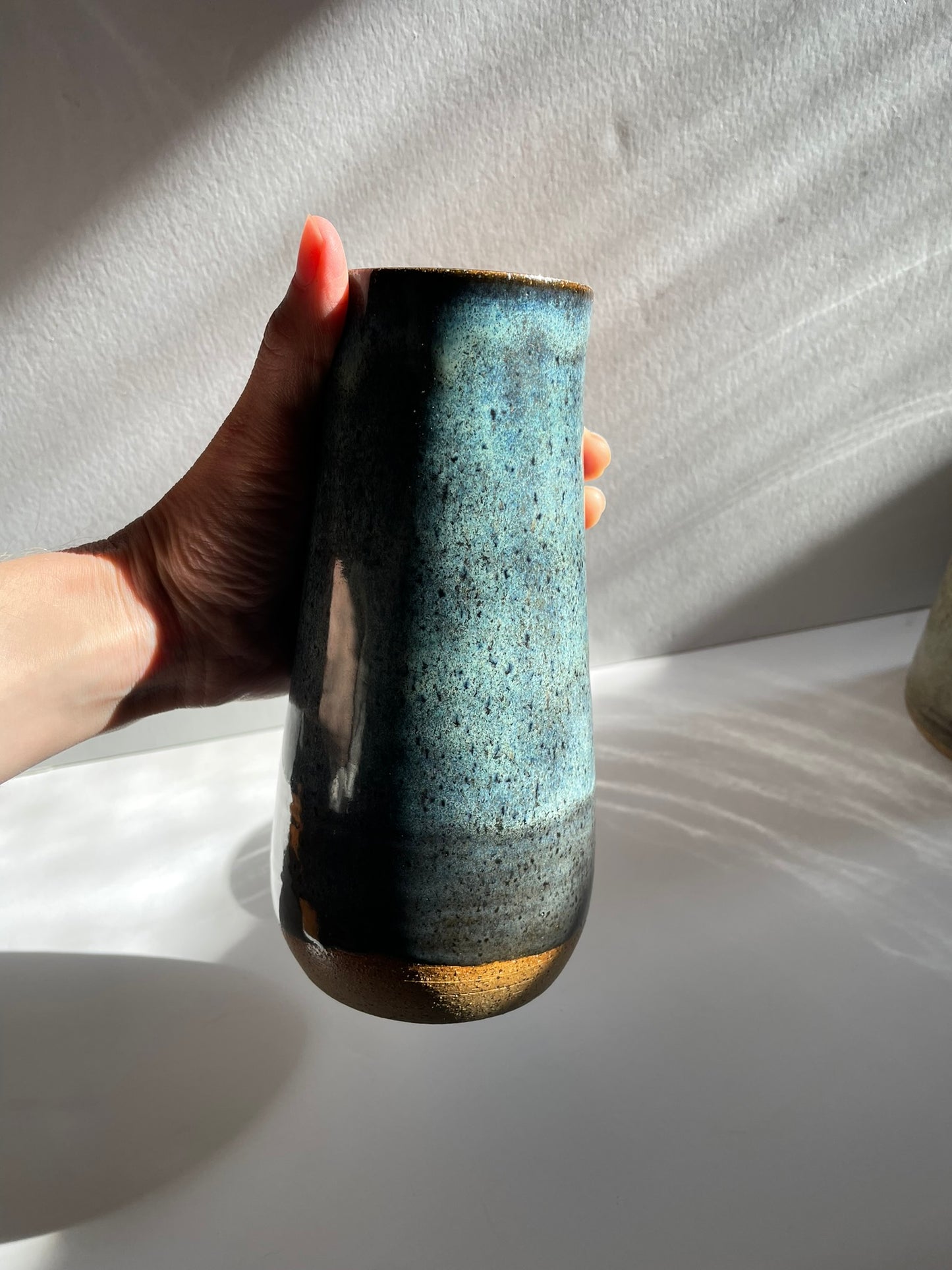 Tall blue vase