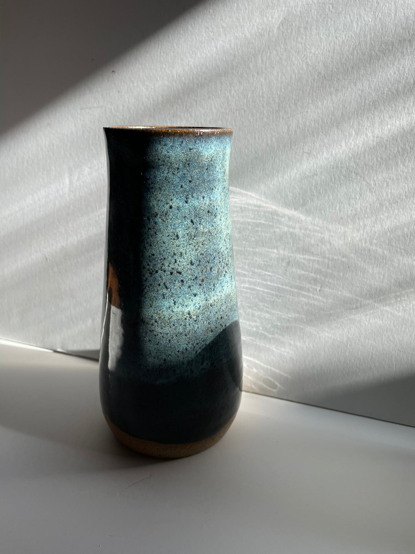 Tall blue vase