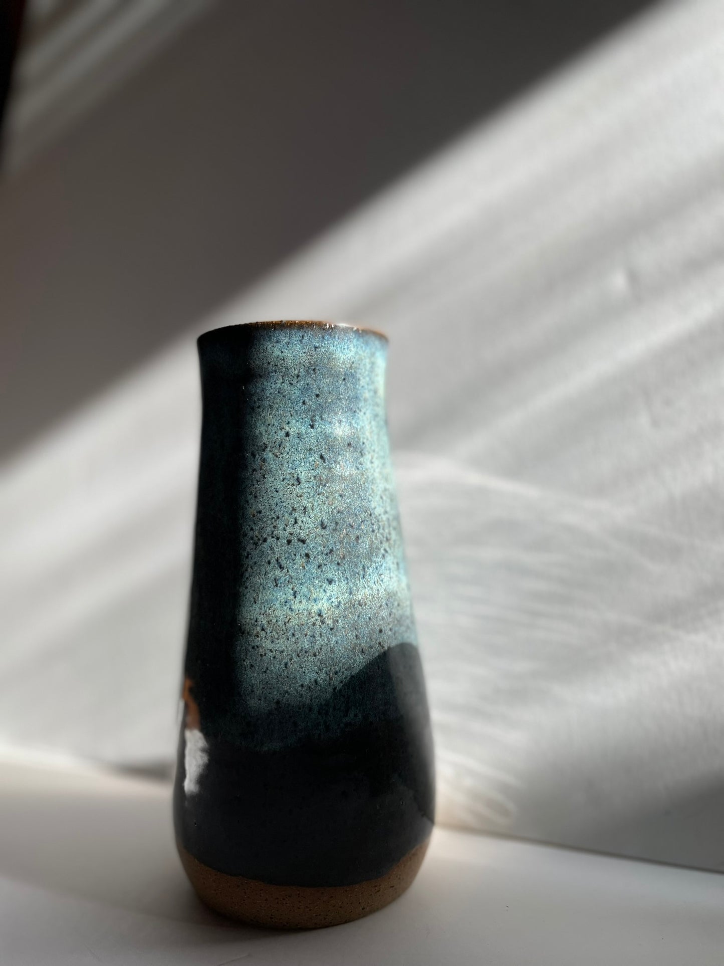 Tall blue vase