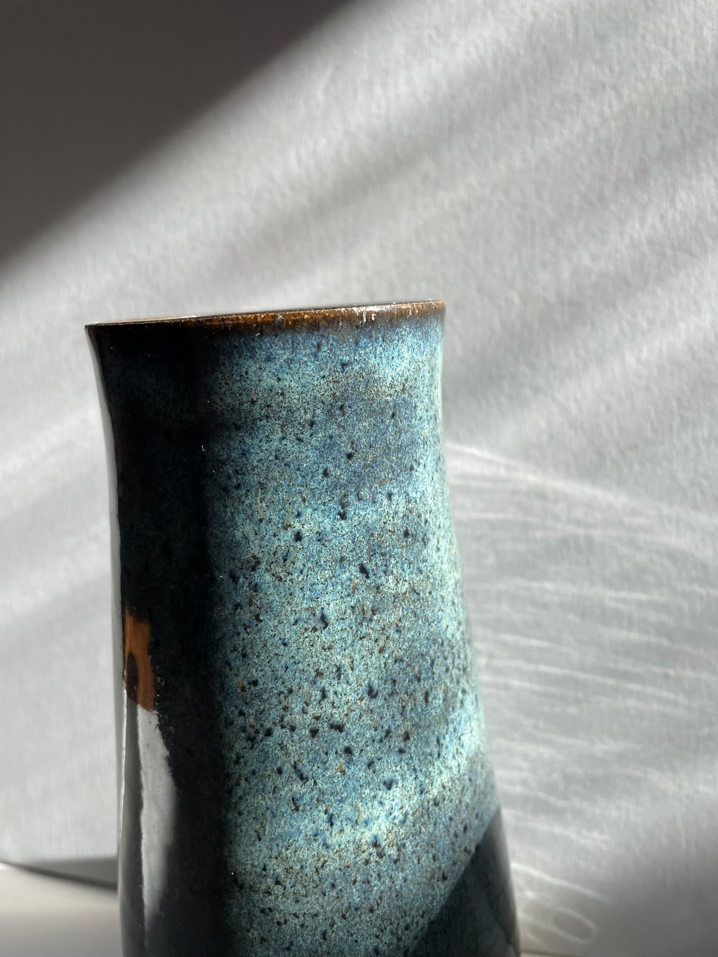 Tall blue vase