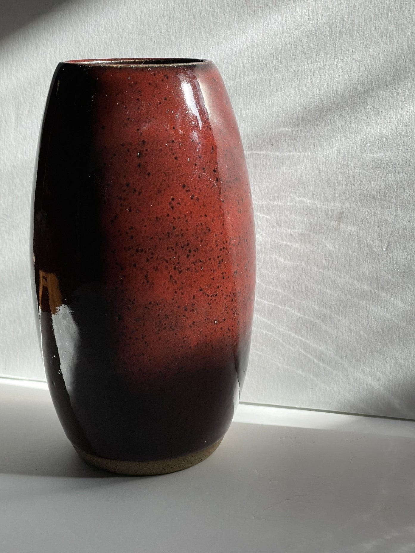 Red oval vase