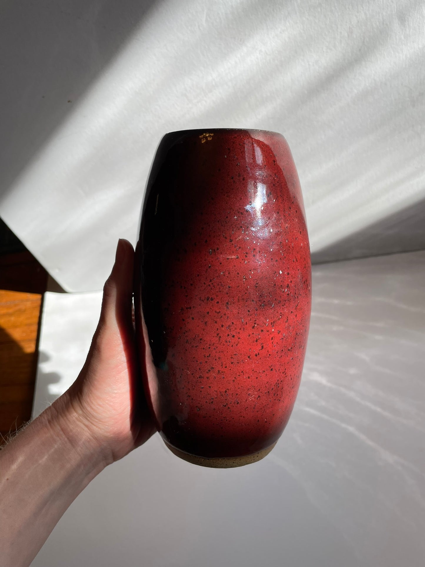 Red oval vase