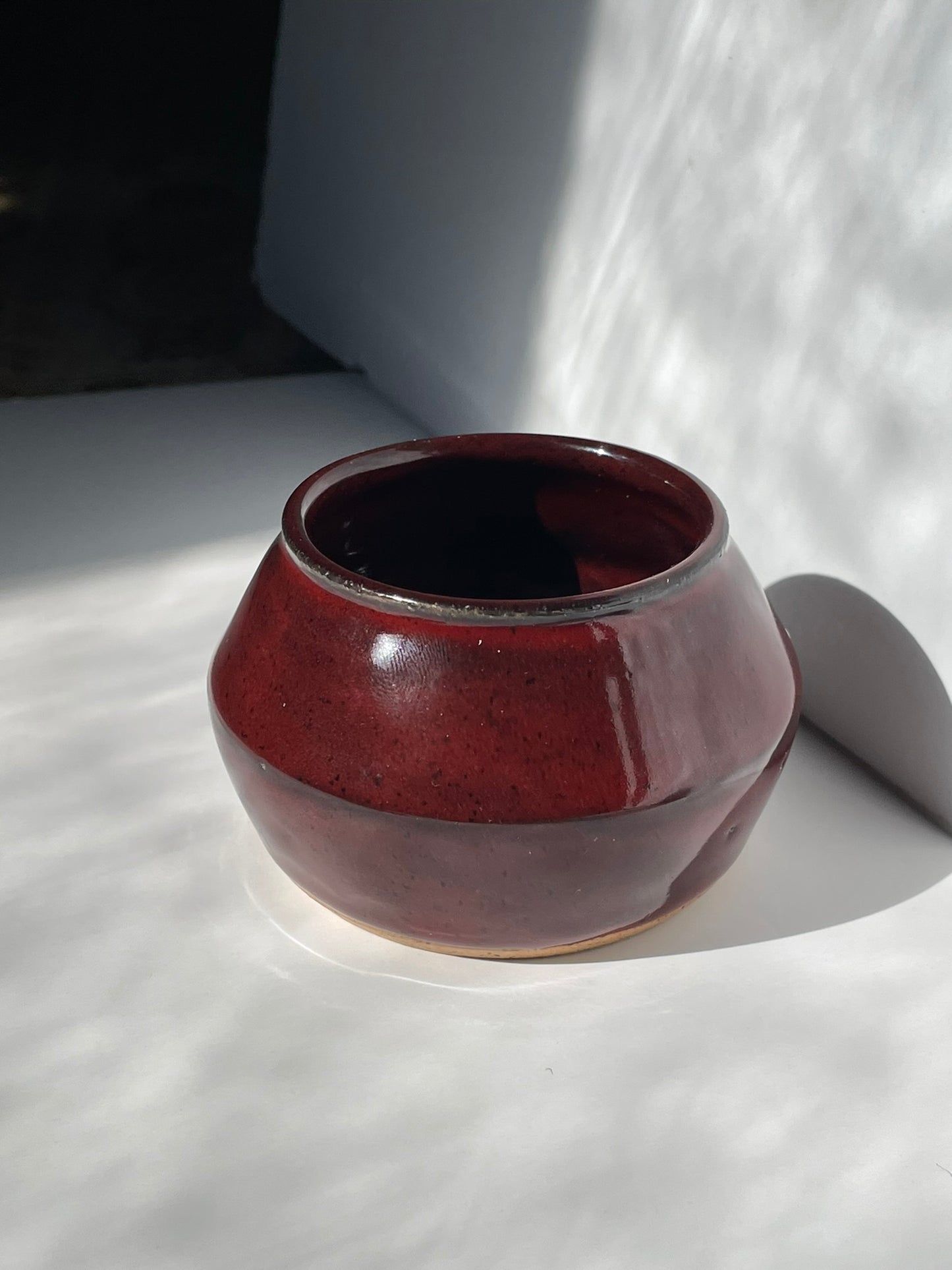 A. Short red vase