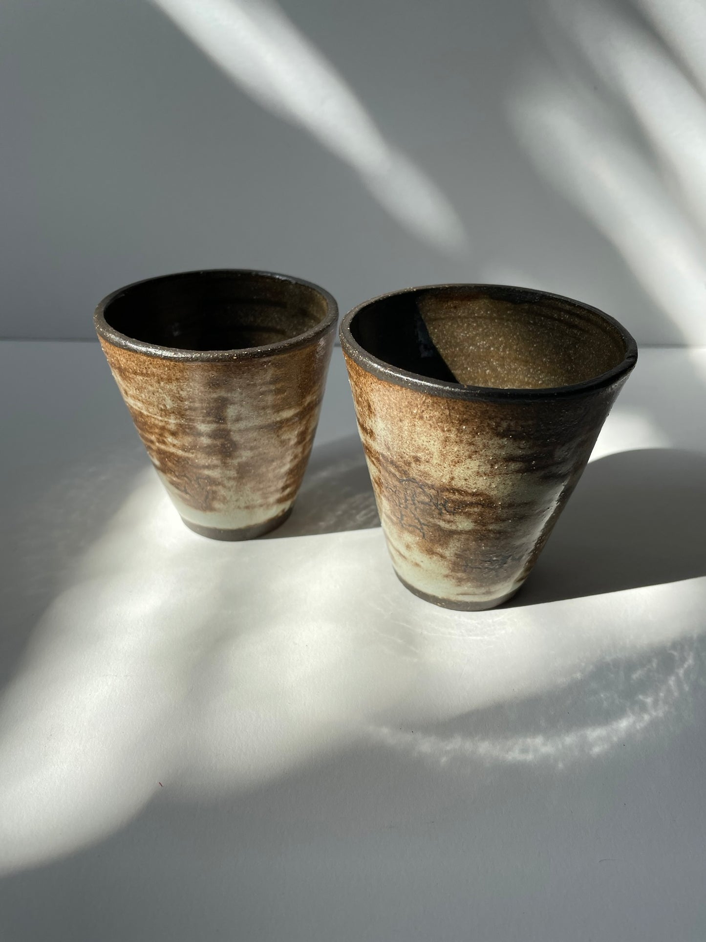 A. Small cups or planters